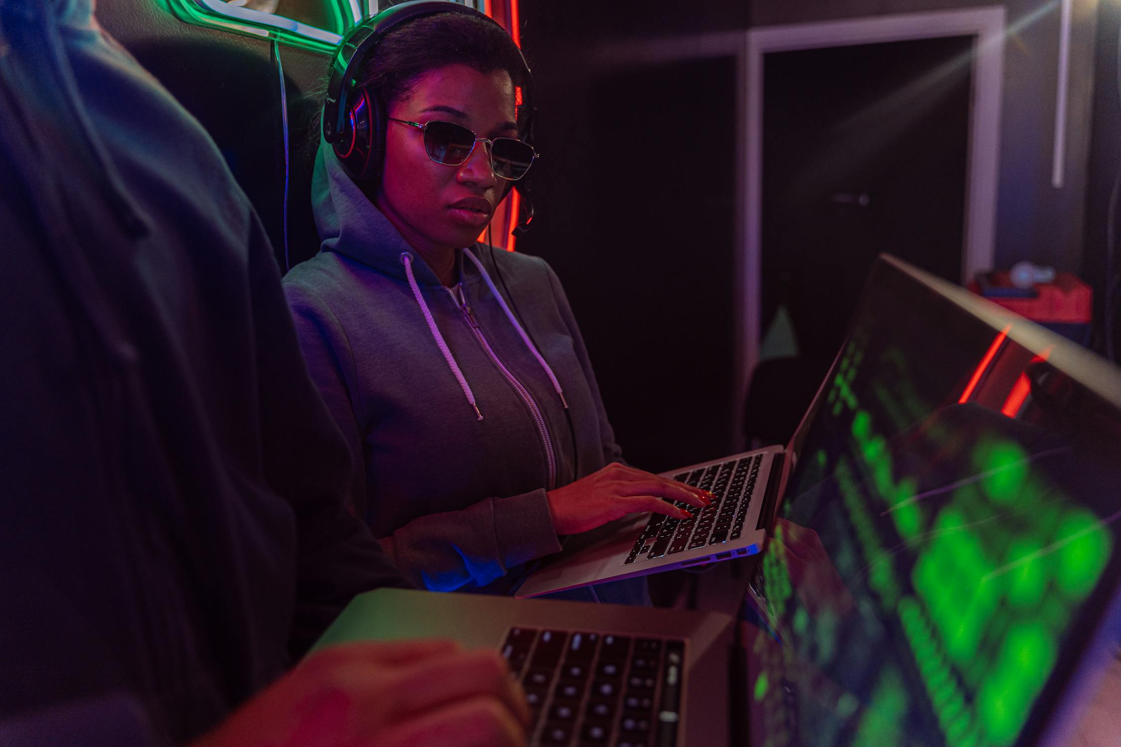 Laptop with neon lighting cyberpunk ambiance